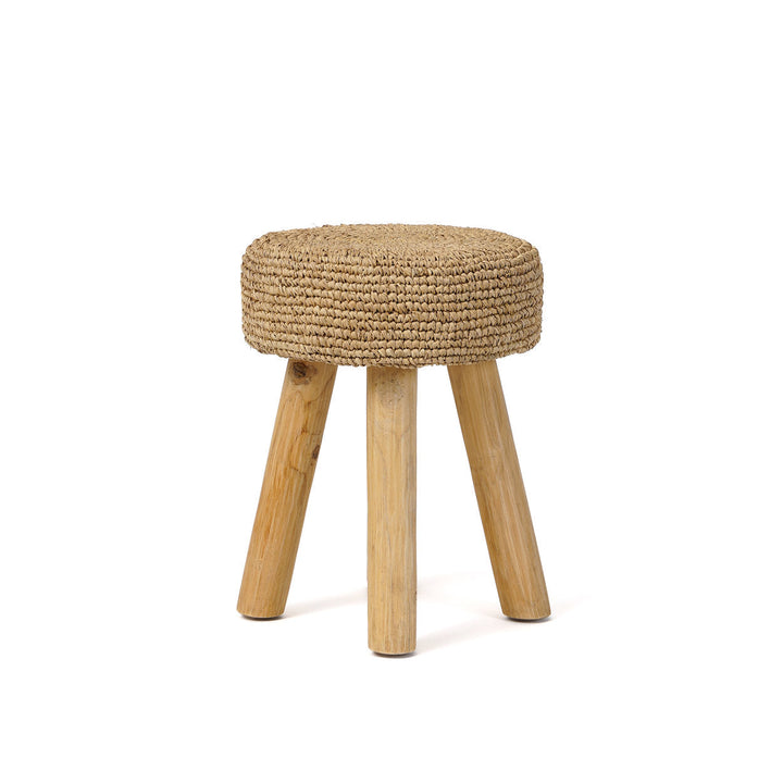 Small stool with woven top and wooden legs on a white background