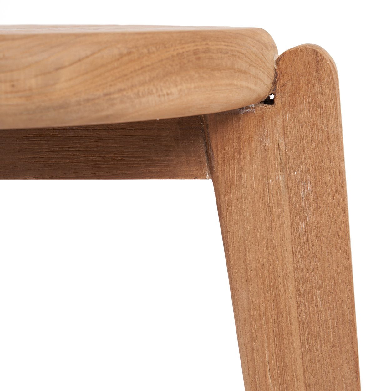 Close-up of a wooden chair with a visible joint on a white background