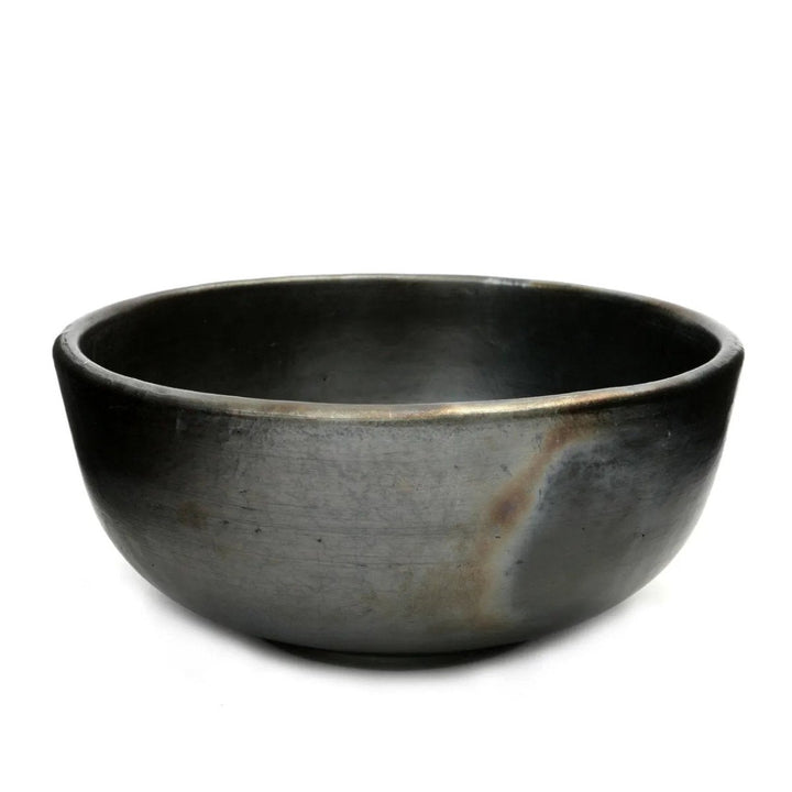 Black ceramic bowl on a white background