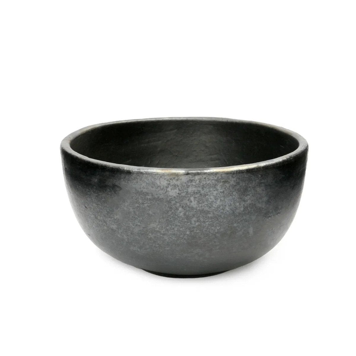 Black ceramic bowl on a white background