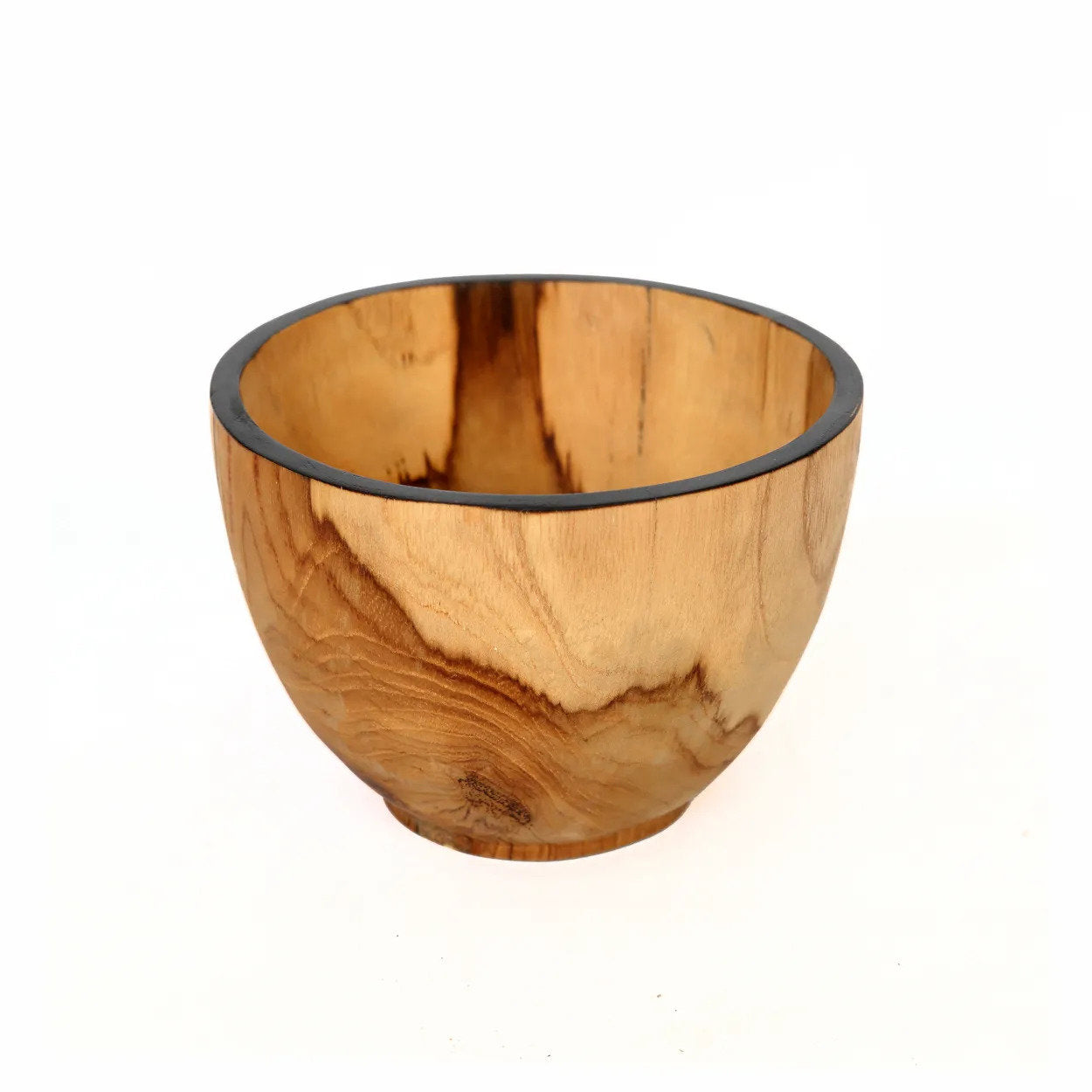 Wooden bowl with a black rim on a white background