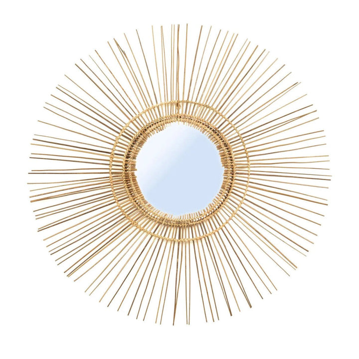 Decorative wall mirror with sunburst design on a white background