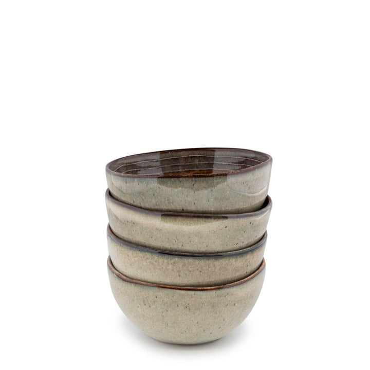 Set of four ceramic bowls with a brown rim on a white background