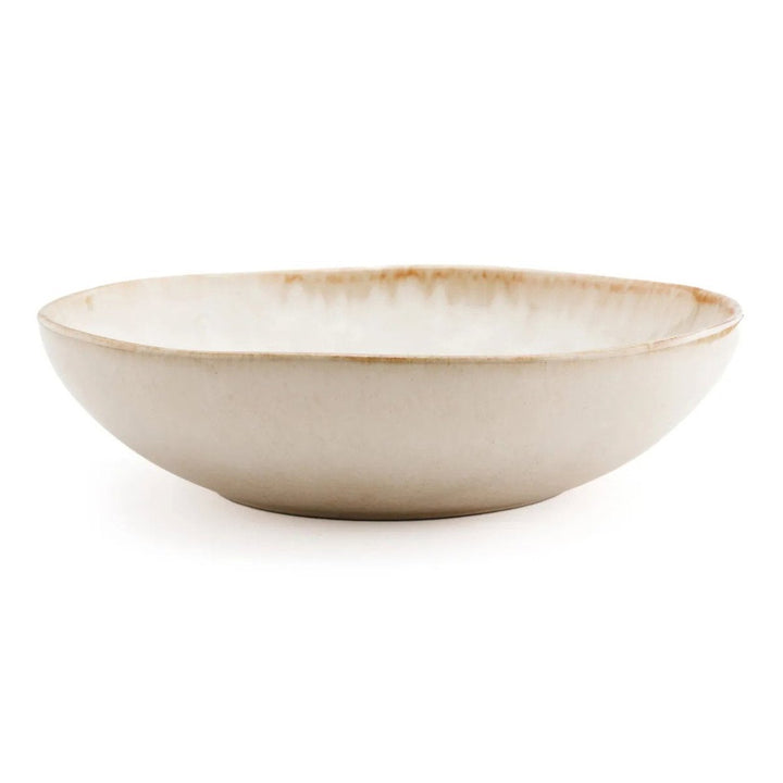 Beige ceramic bowl on a white background