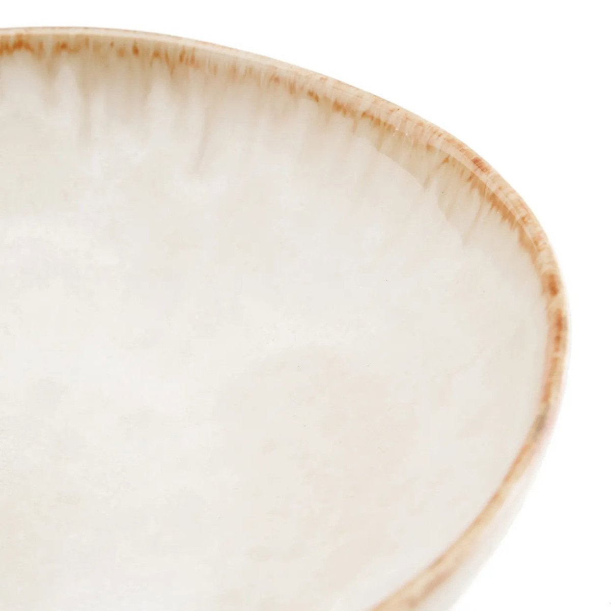 Close-up of a ceramic plate with a beige rim on a white background