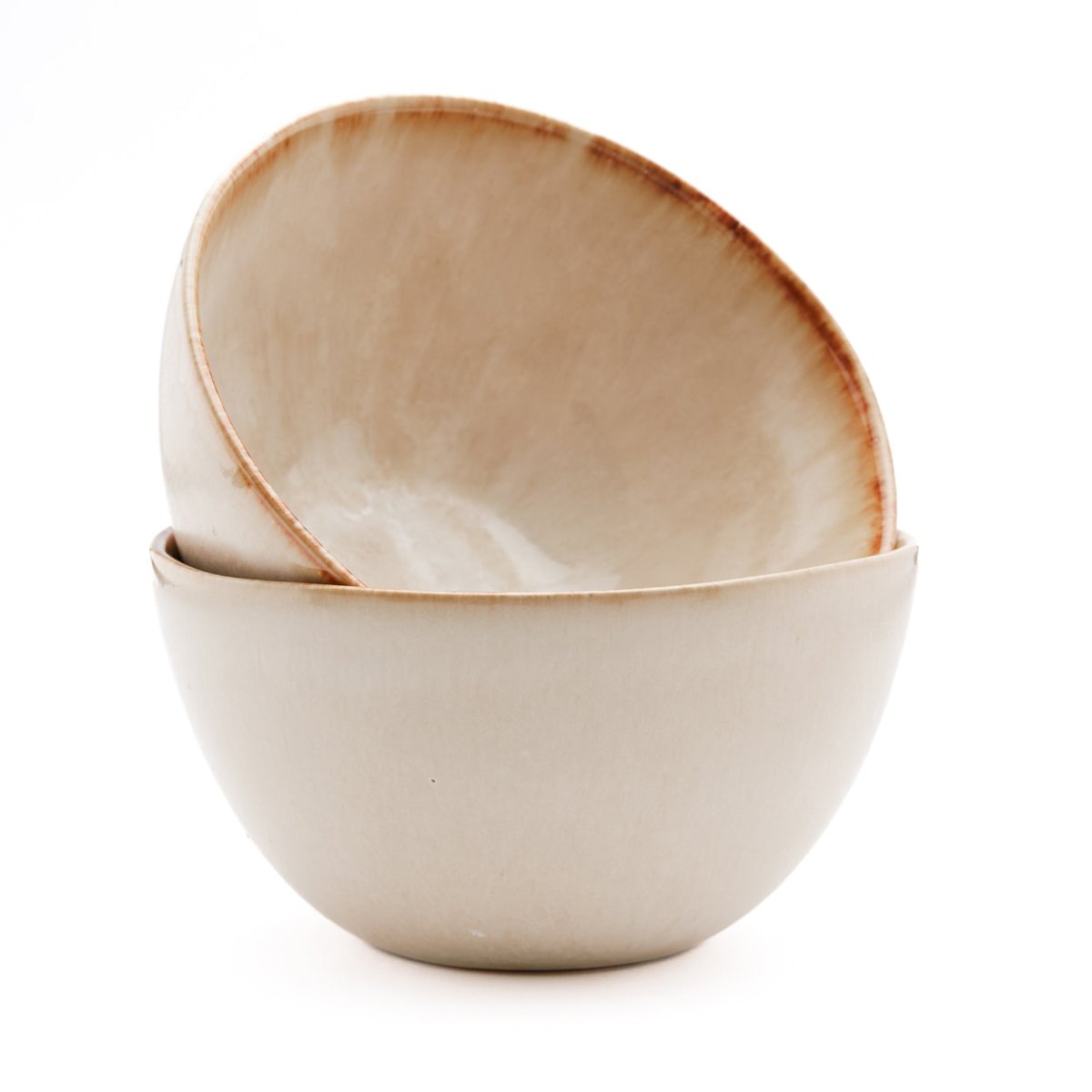 Two beige ceramic bowls stacked on a white background
