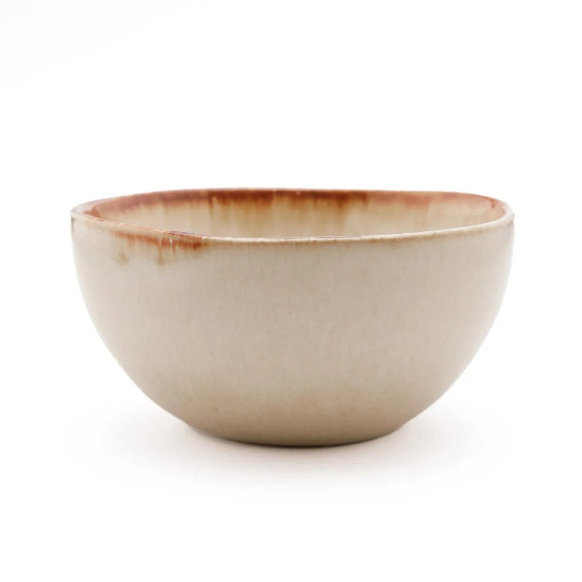 Beige ceramic bowl with brown rim on a white background
