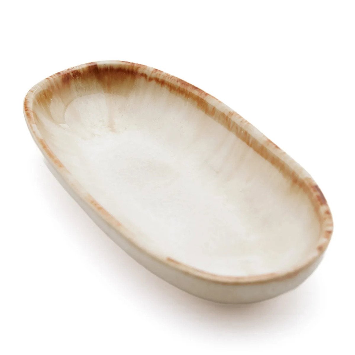 Oval ceramic dish with brown rim on a white background