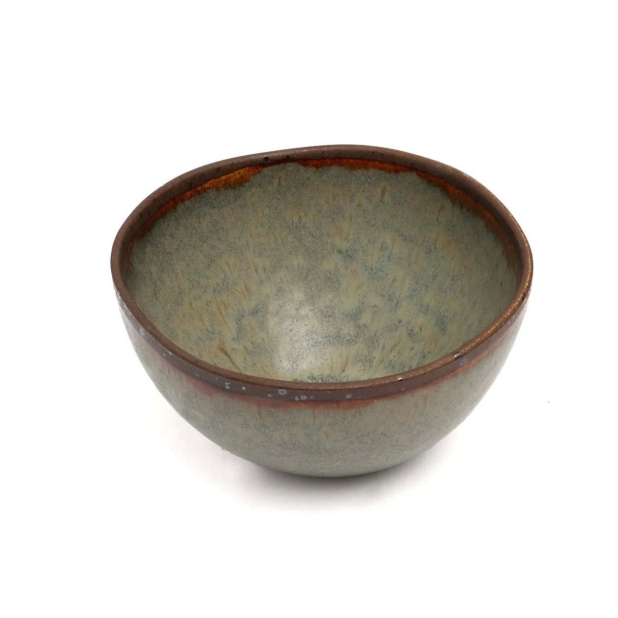 Ceramic bowl with a textured surface on a white background