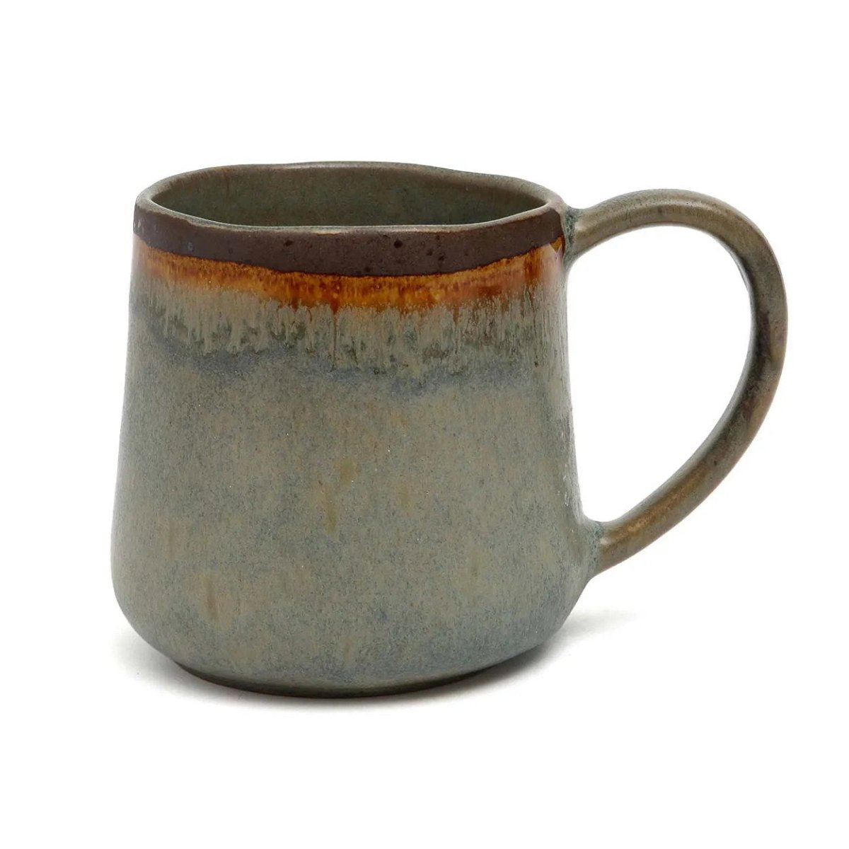 Ceramic mug with a textured surface on a white background