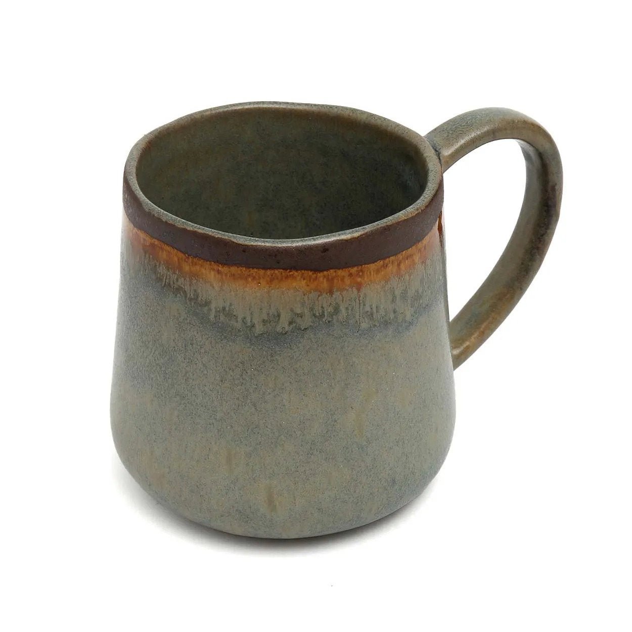 Ceramic mug with a brown rim and handle on a white background