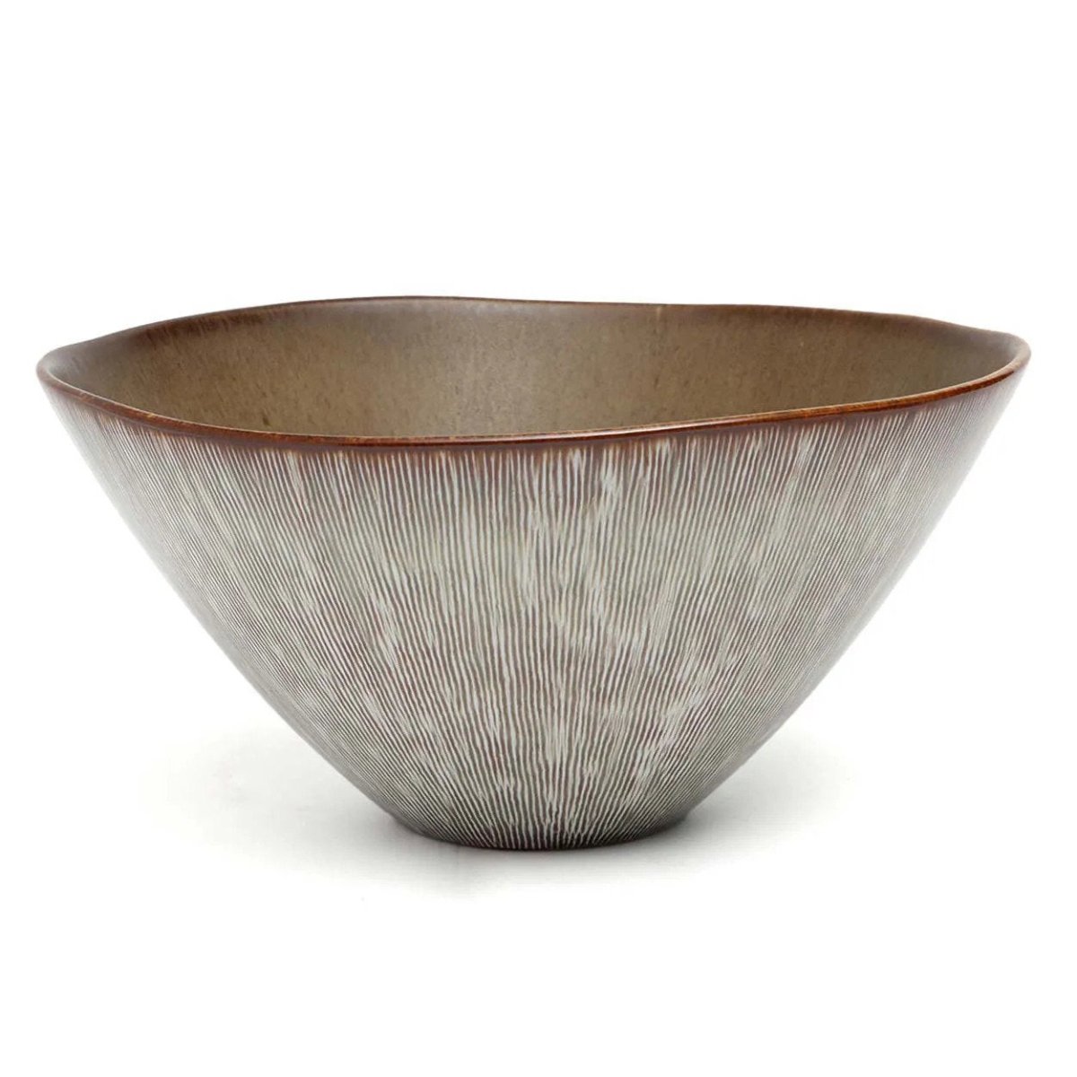 Ceramic bowl with textured surface on a white background