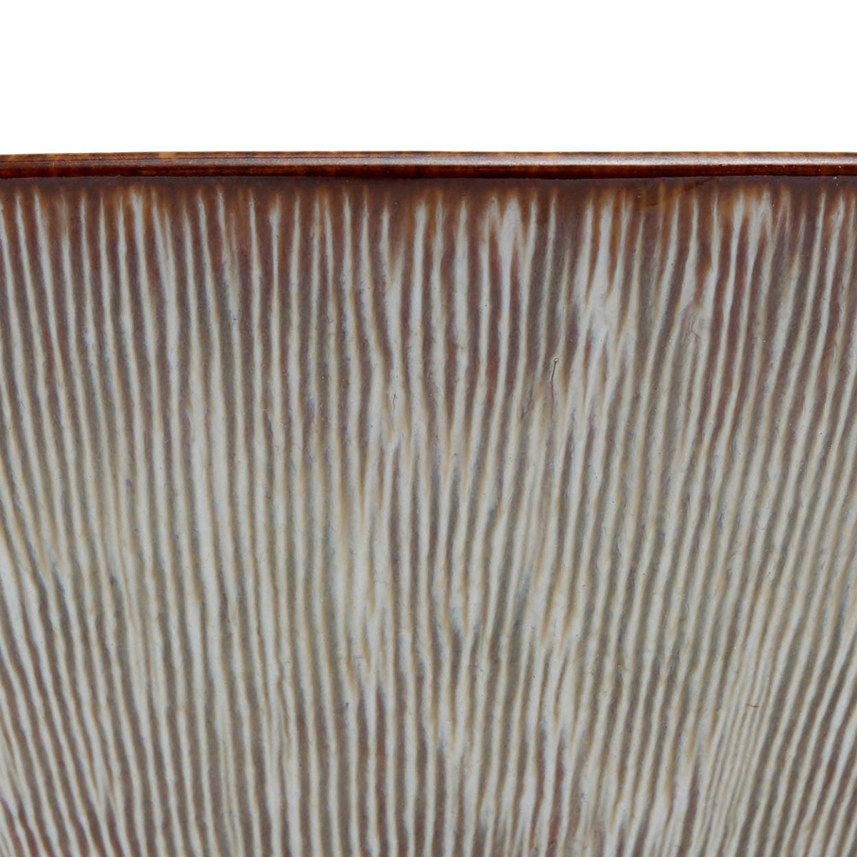 Close-up of a ceramic planter with textured surface and brown rim on a white background