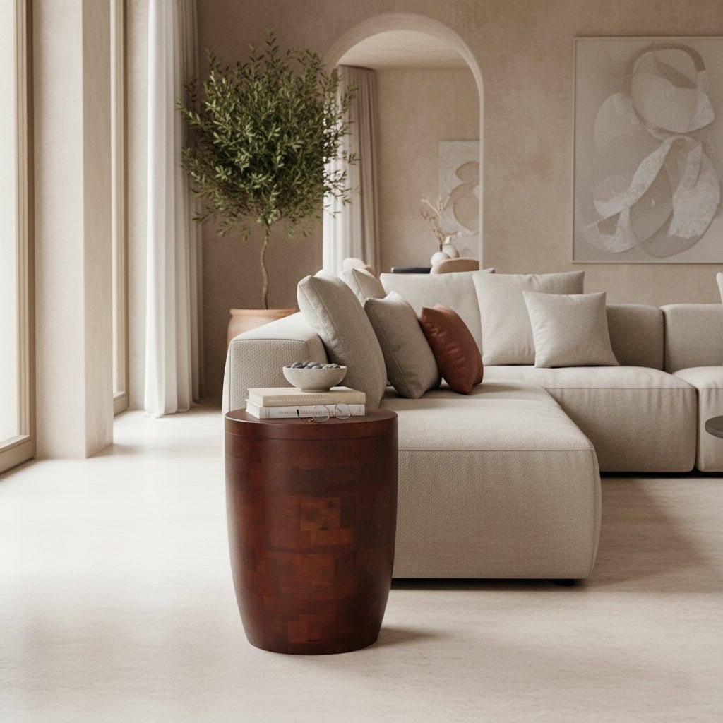 Modern living room with a beige sectional sofa, wooden side table, and abstract art on the wall.