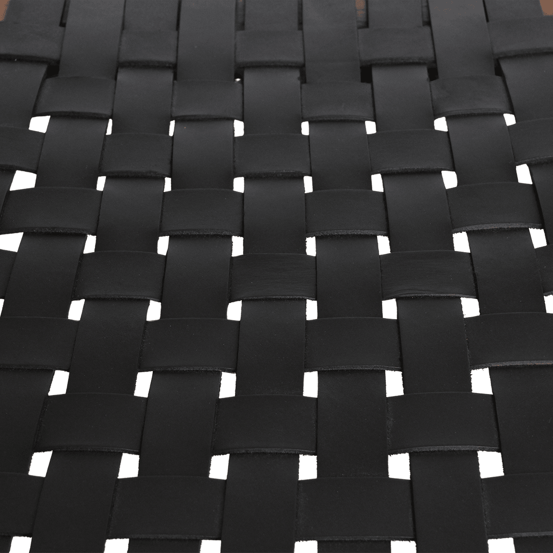 Close-up of a woven black leather pattern