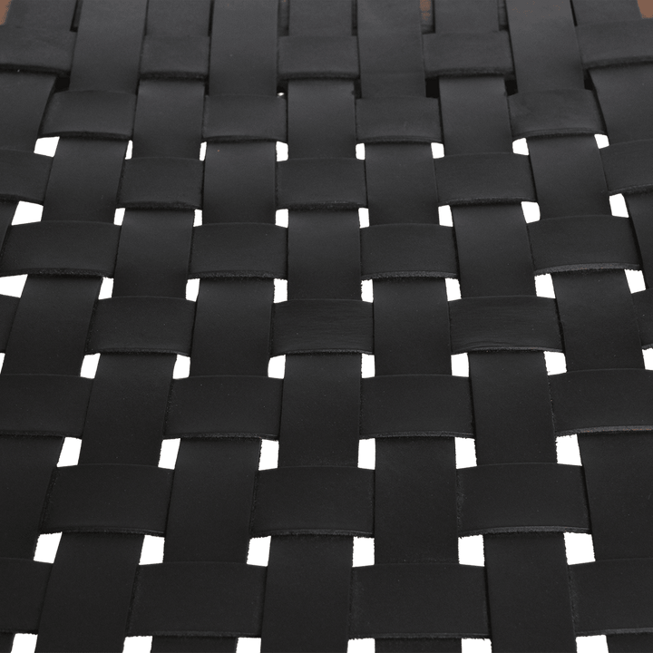 Close-up of a woven black leather pattern