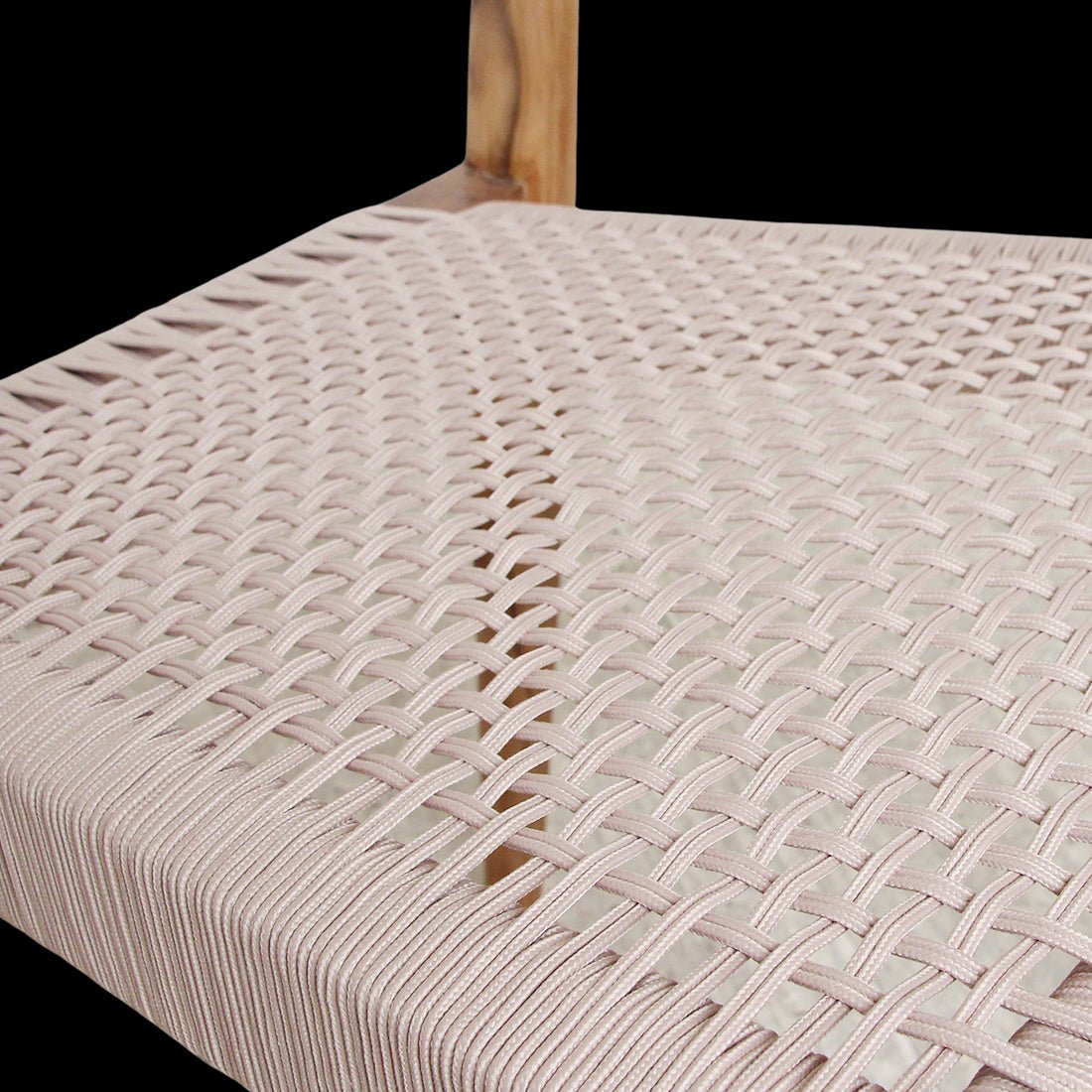 Close-up of a woven chair seat with a neutral color on a white background