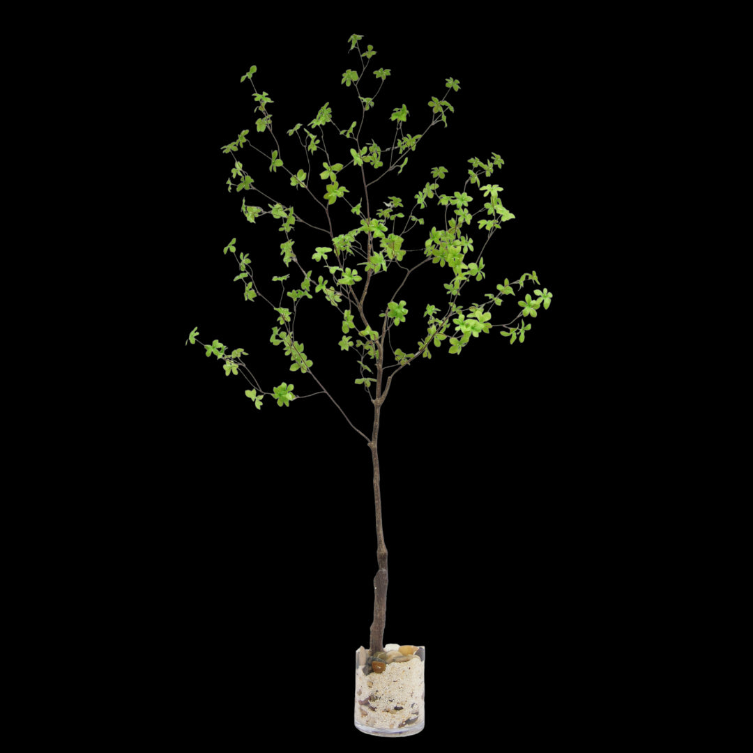 Artificial potted plant with green leaves on a white background