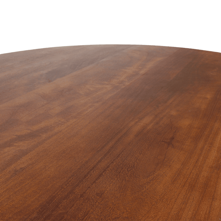 Close-up of a wooden surface with a rich brown color and visible grain pattern.