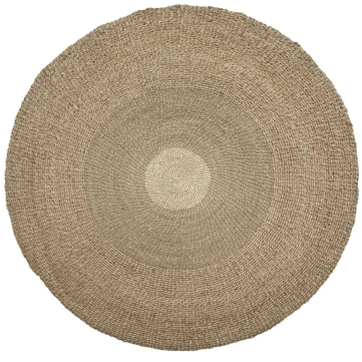 Round woven rug with a beige color on a white background