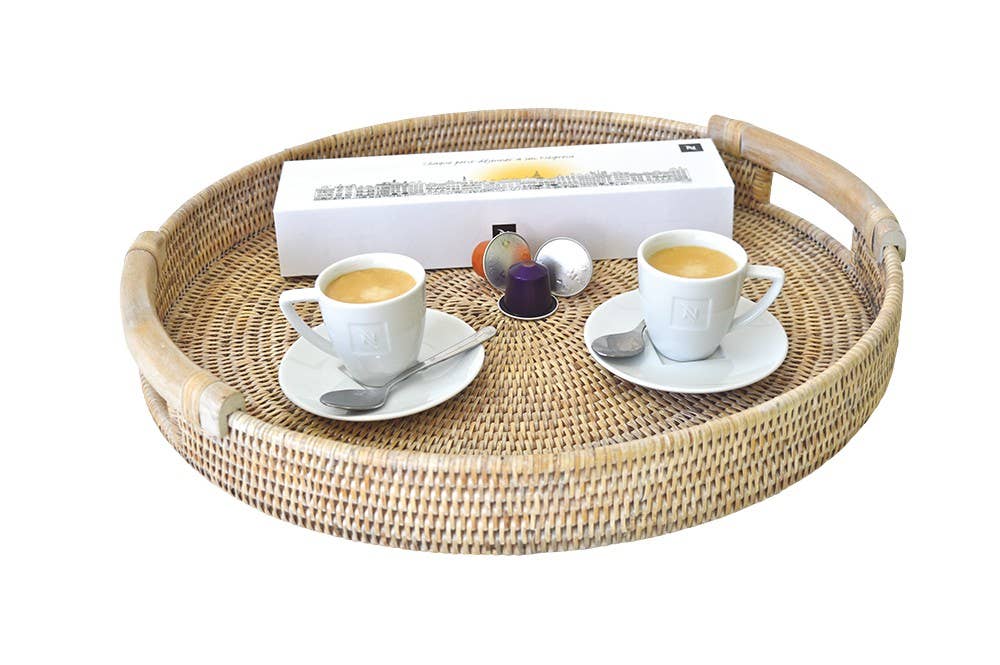 Samoa White Washed Round Rattan Tray 45cm with handles, featuring two espresso cups and coffee capsules.