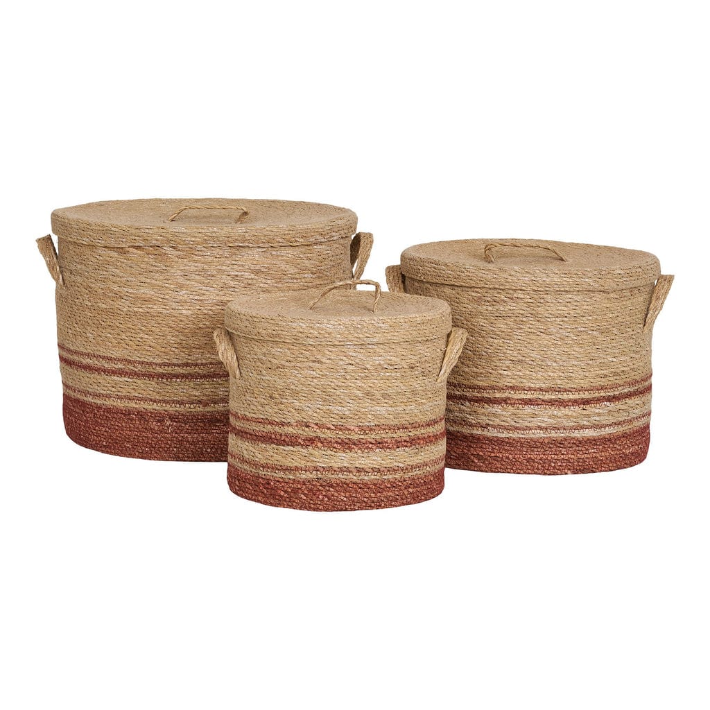 Set of 3 Budoni seagrass baskets in natural and brown hues.