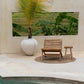 Islander Eenzit - Natural teak wood chair beside pool and plant, outdoor setting.