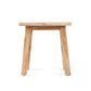 Makara Stool made from natural reclaimed teak wood with textured grain patterns.