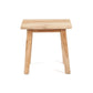 Makara Stool made from natural reclaimed teak wood, showcasing unique grain patterns and eco-friendly design.