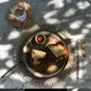 Seagrass Shell Placemat with cowrie shell border on dining table.