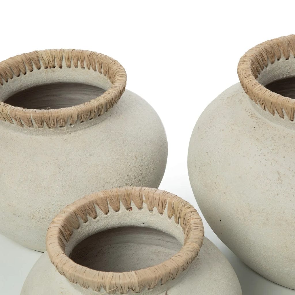 Styly Vase with raffia detail, natural concrete color, terracotta material.