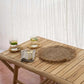 Tulum Coffee Table made from durable teak wood, styled for outdoor elegance.