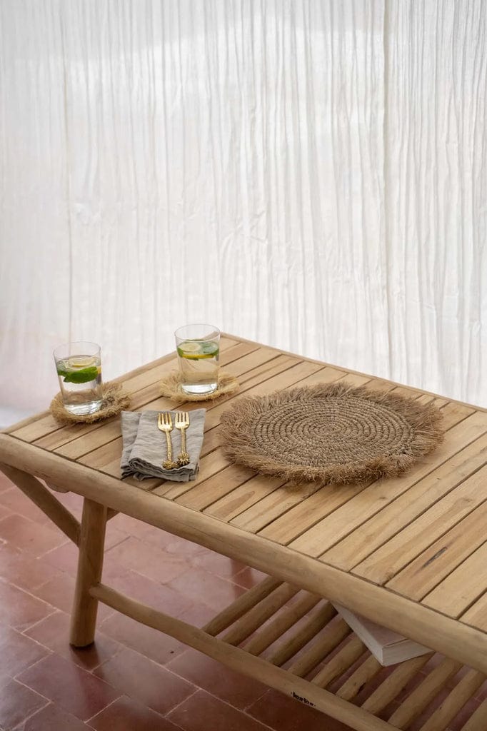 Tulum Coffee Table made from durable teak wood, styled for outdoor elegance.