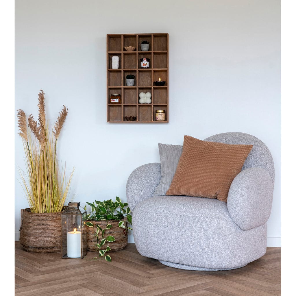 Erba Banana Leaf Baskets in a cozy living room setting, showcasing natural and rustic storage solutions.