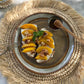 Comporta Dessert Plate with vibrant colors and crackle glaze showcasing dessert on woven placemat.