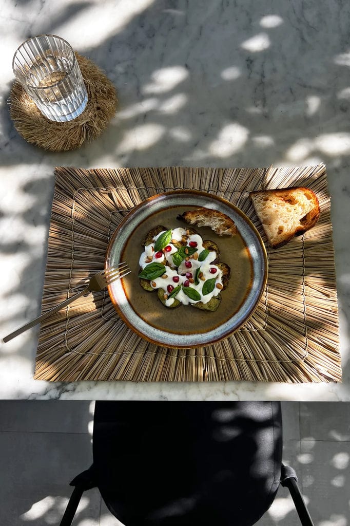 Comporta Dessert Plate showcasing artistic ceramic design with food.