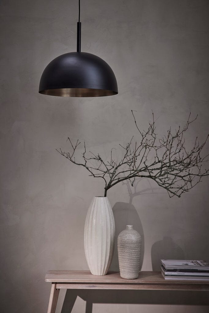 Esme Decor Vase h51 cm Off White on a wooden shelf next to a smaller vase under a black pendant lamp.