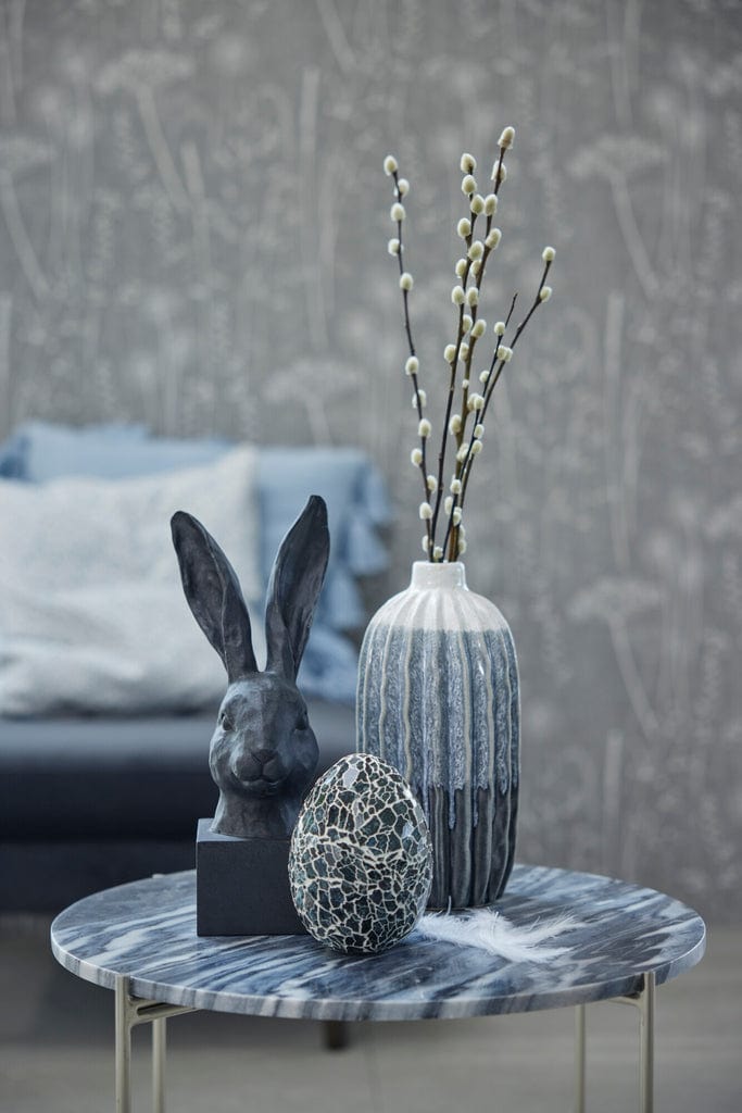 Aysia multicolor ceramic vase in white, grey, and blue tones on a table setting.