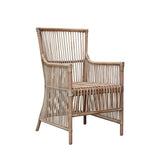 Norah handwoven rattan dining chair in natural design, crafted sustainably.