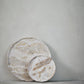 Ellia Marble Tray Ø40cm Linen with unique color tones against a neutral background.