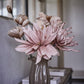 Ellia Marble Jar on wooden table with pink flowers in ceramic vase.