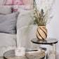 Ellia Marble Jar - Elegant Handcrafted Storage Jar on marble side table in stylish living room setting.