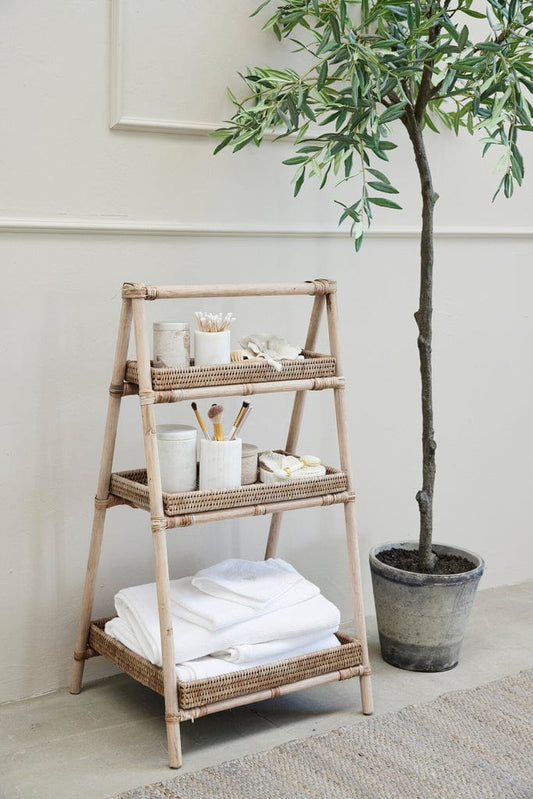 Norah handwoven 3-tier rattan shelf 45x40 cm with decor items and towels.