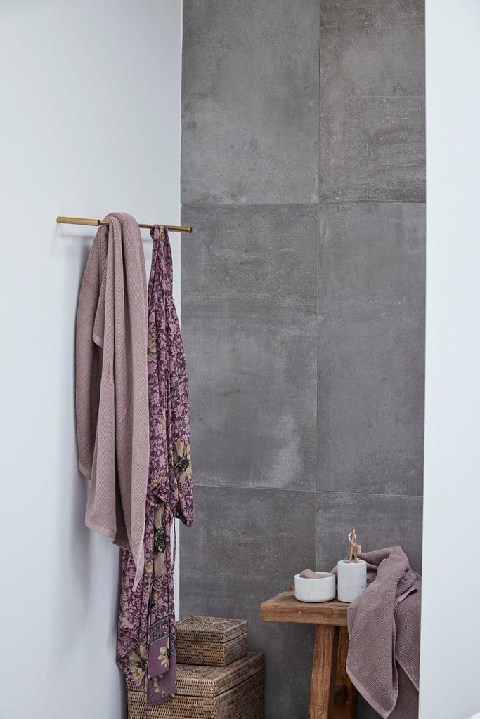 Bath Towek hanging on rack 