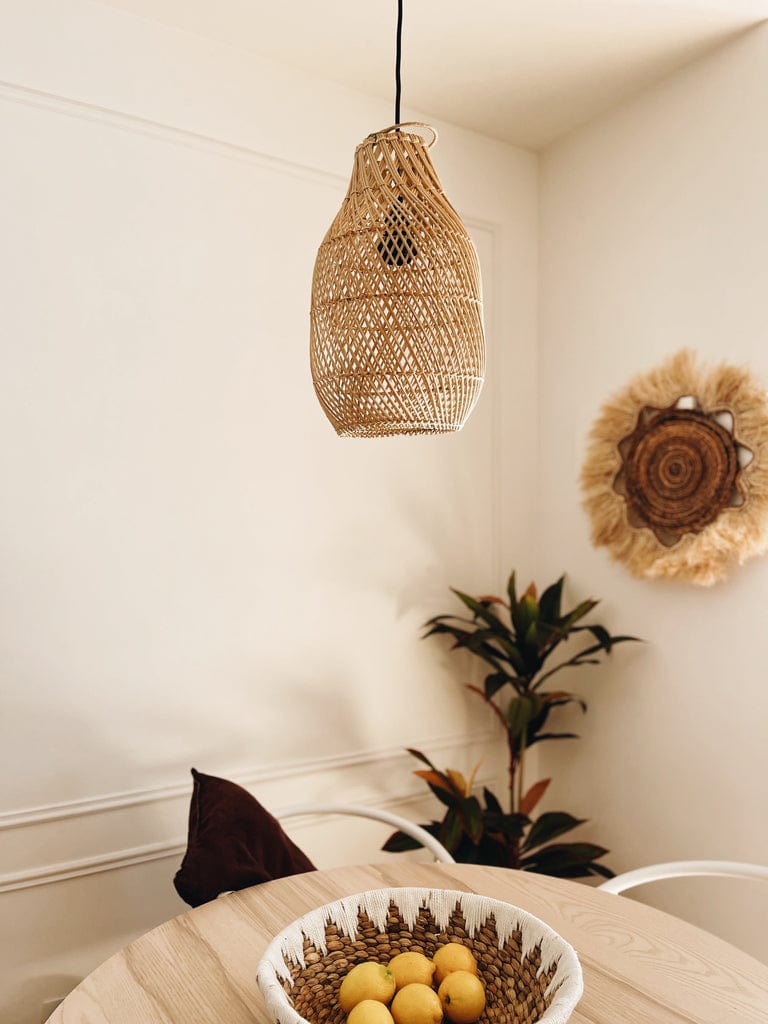 Corner with pendant lamp over corner table